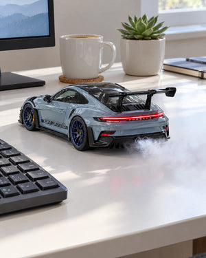 Porsche GT3 RS MistGarage model car with mist on a desk